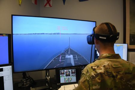 Naval ROTC midshipman uses simulator equipment.