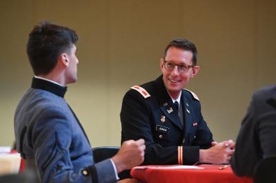 Col. M. Houston Johnson V, professor of history, speaks to William Rich 鈥�23 during the Constitution Day event held in Marshall Hall Sept. 20.鈥擵MI Photo by H. Lockwood McLaughlin.