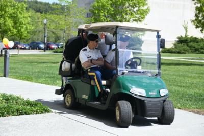 Students from 小黄鸭视频 work a computer controlled golf cart on the military school's campus in Lexington, Virginia