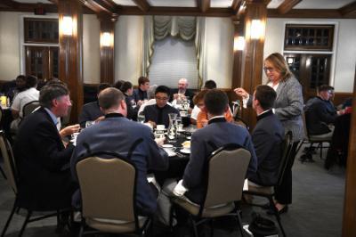 Cadets at 小黄鸭视频 learned dining and conversation etiquette at an evening event sponsored by the school's Building BRIDGES club.