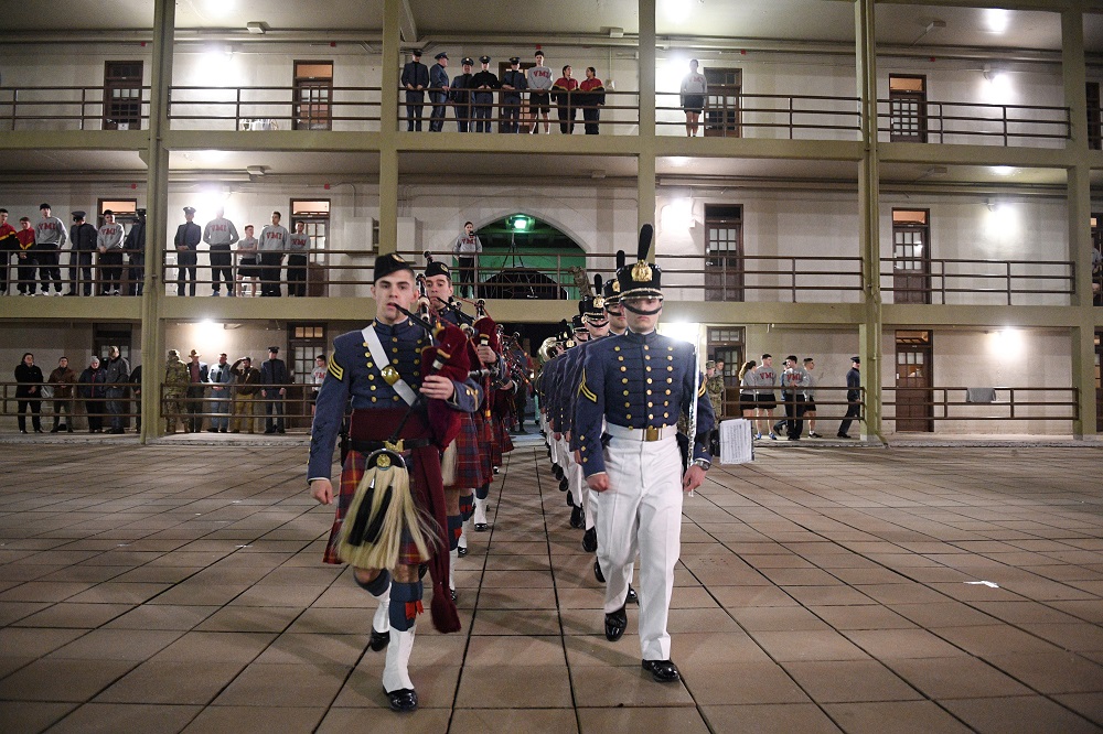 Members of the Regimental Band and the Pipe Band march into barracks for the tribute to Capt. Jack Casey 鈥�19.